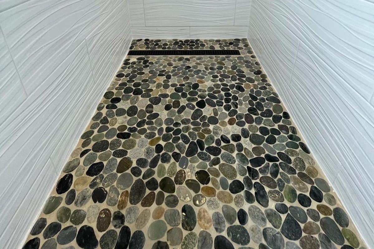 flat pebble shower floor